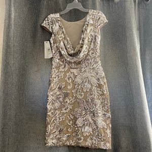 Brand new sequin and nude color Calvin Klein dress.